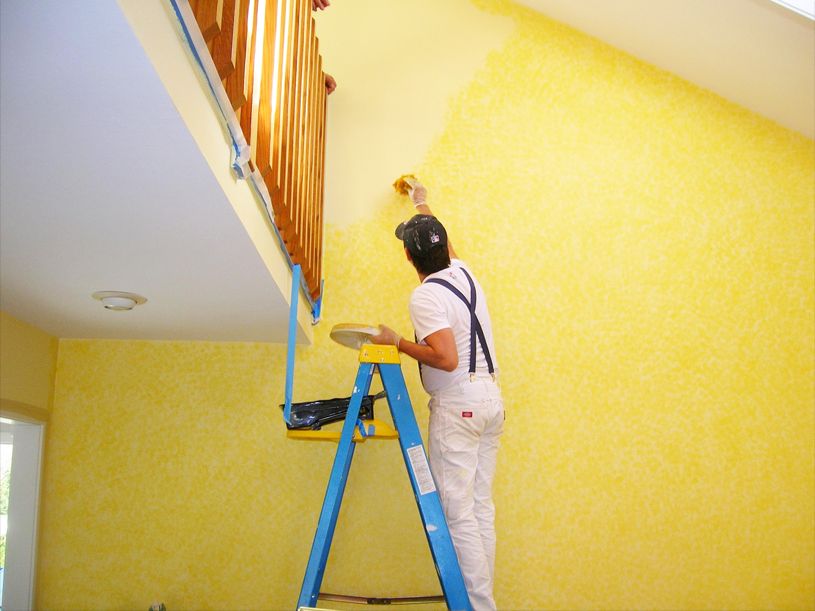 Interior painting service in a modern Dubai villa living room
