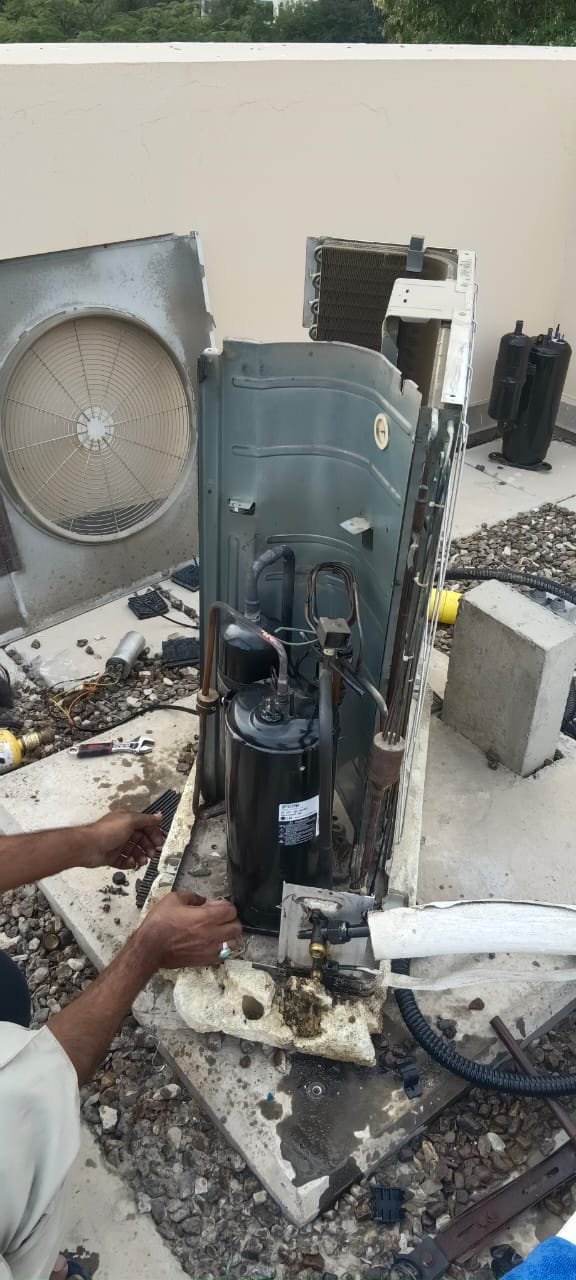Outdoor AC compressor repairing